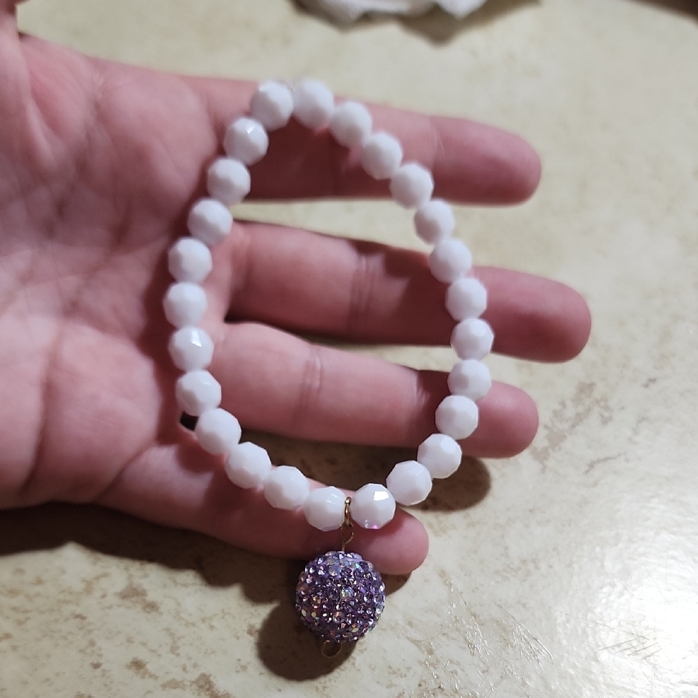 Elegant White Beaded Bracelet with Purple Charm
